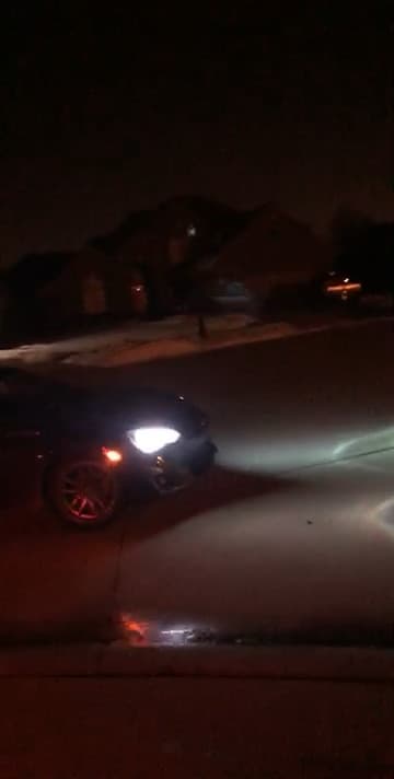 BRZ doing donuts at night in a quiet neighborhood